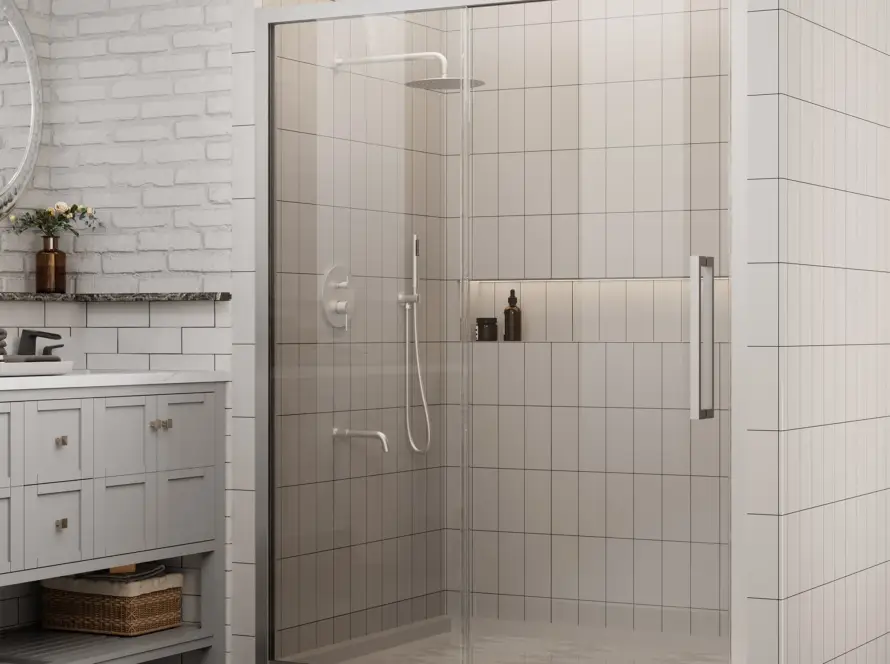 Sliding shower door with clear glass panels and chrome hardware installed in a modern bathroom with tiled walls.