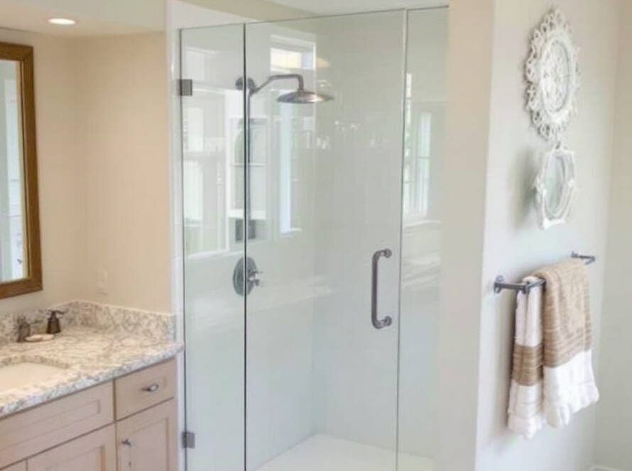 Alternative text: Custom frameless modern shower glass installation near Saugus, MA