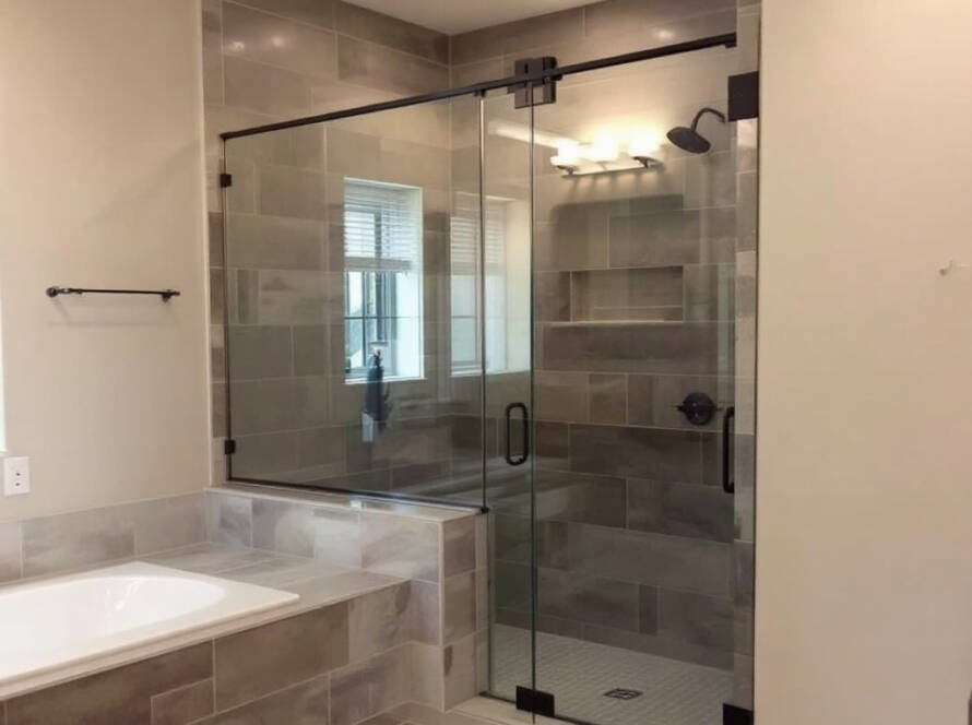 Alt Text: 'Modern and contemporary styled shower door newly installed by discerning services in Boston'