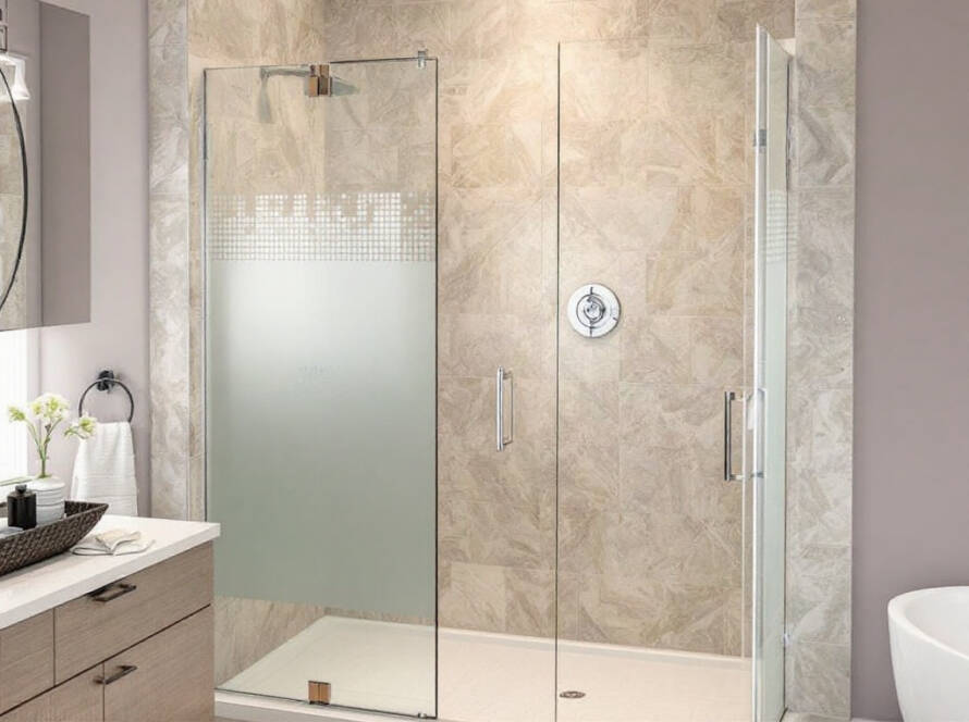 Picture showing a modern, contemporary design of a custom installed frameless shower door, giving the bathroom an elevated look.