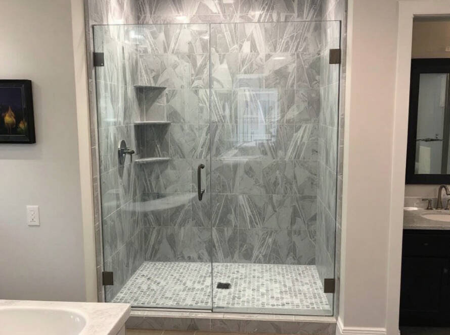 Modern custom frameless glass shower doors transforming a bathroom in Boston.