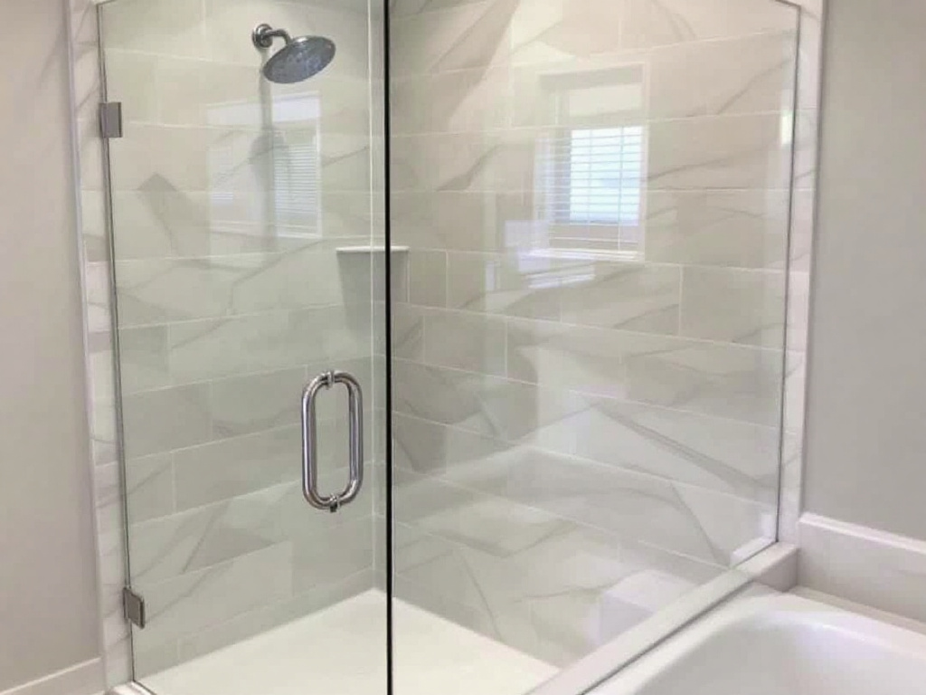 Custom frameless bathroom glass door installation in Walpole, MA.